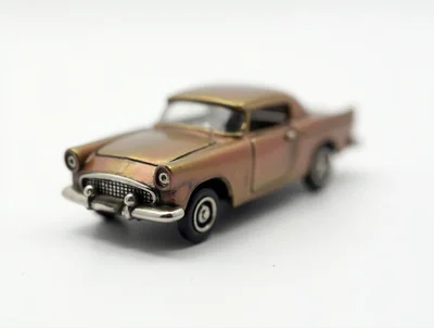 Vintage Bronze Toy Car On White Background