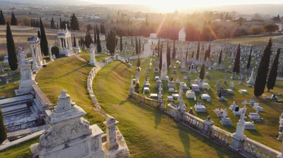 Aerial View Of A Historic Cemetery At Sunset