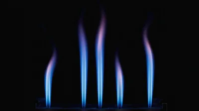 Five Blue Gas Flames Burning In The Dark