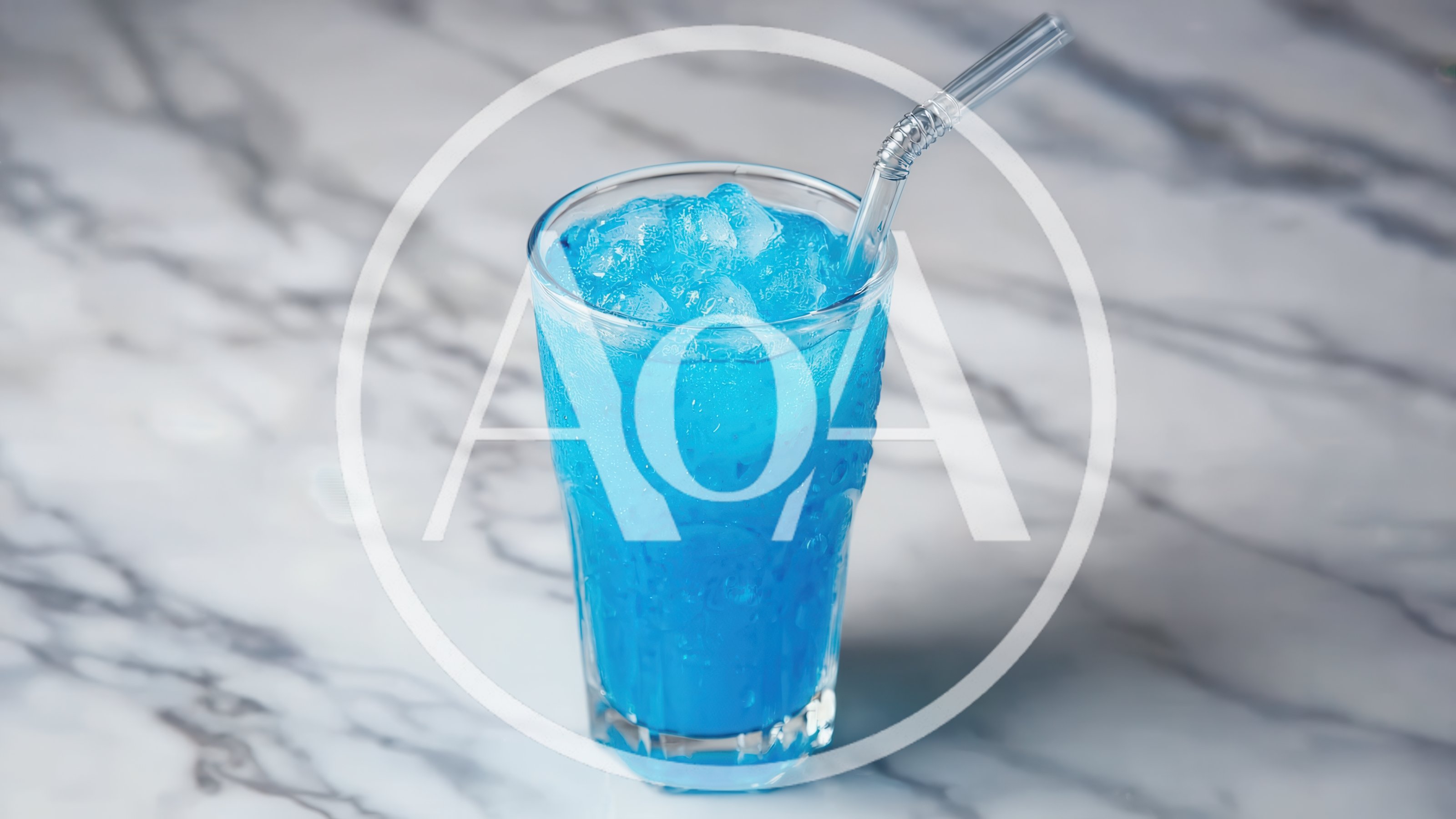 Blue Iced Drink in Glass with Straw