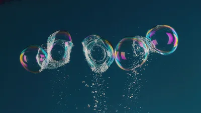 Floating Soap Bubbles With Water Splashes