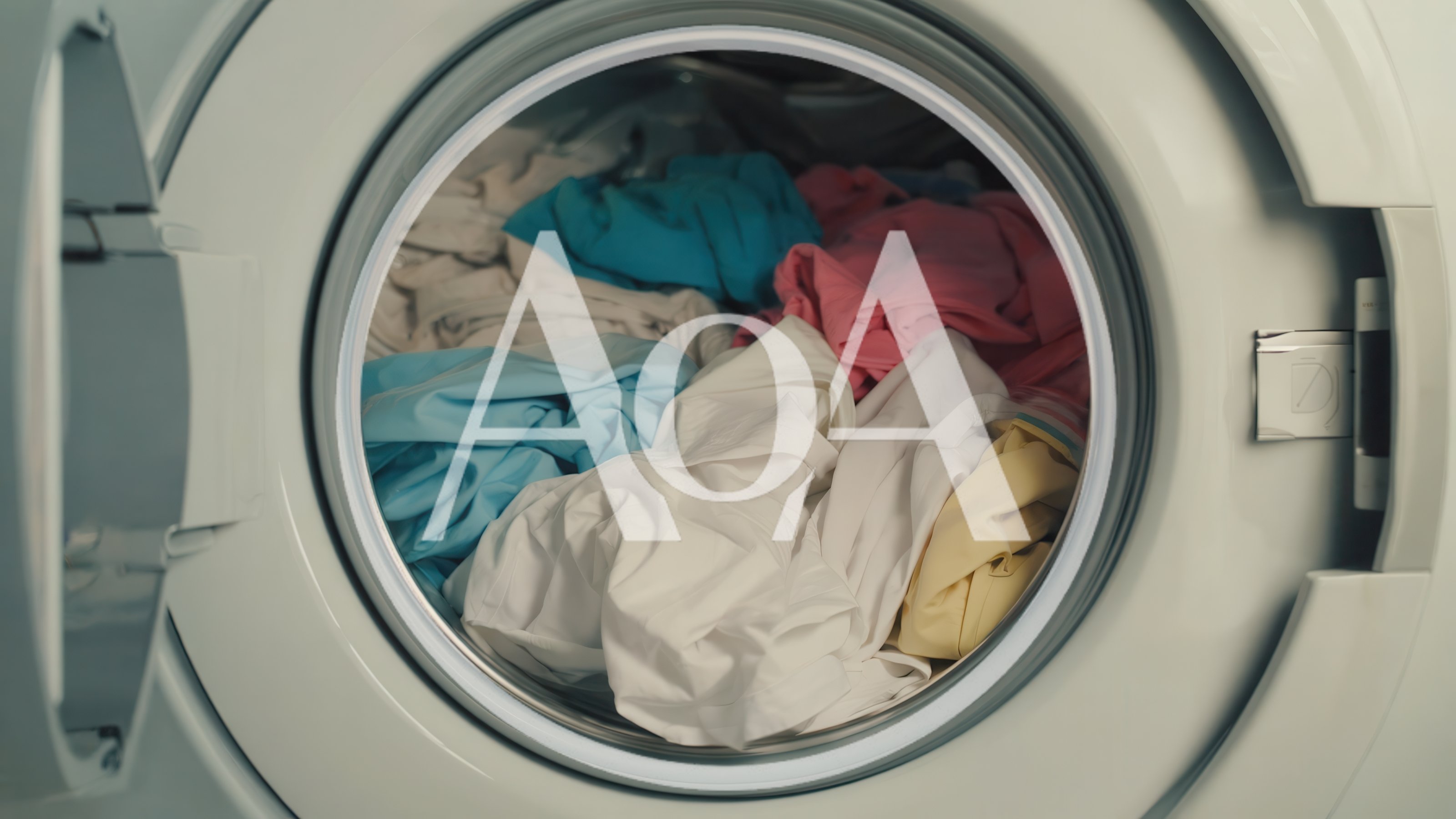 Open Washing Machine Filled With Colorful Laundry