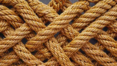 Close Up Of Interwoven Natural Fiber Rope Texture
