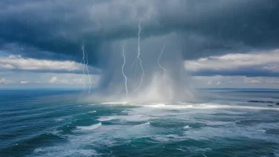 Lightning Strikes During A Heavy Rainstorm Over The Ocean
