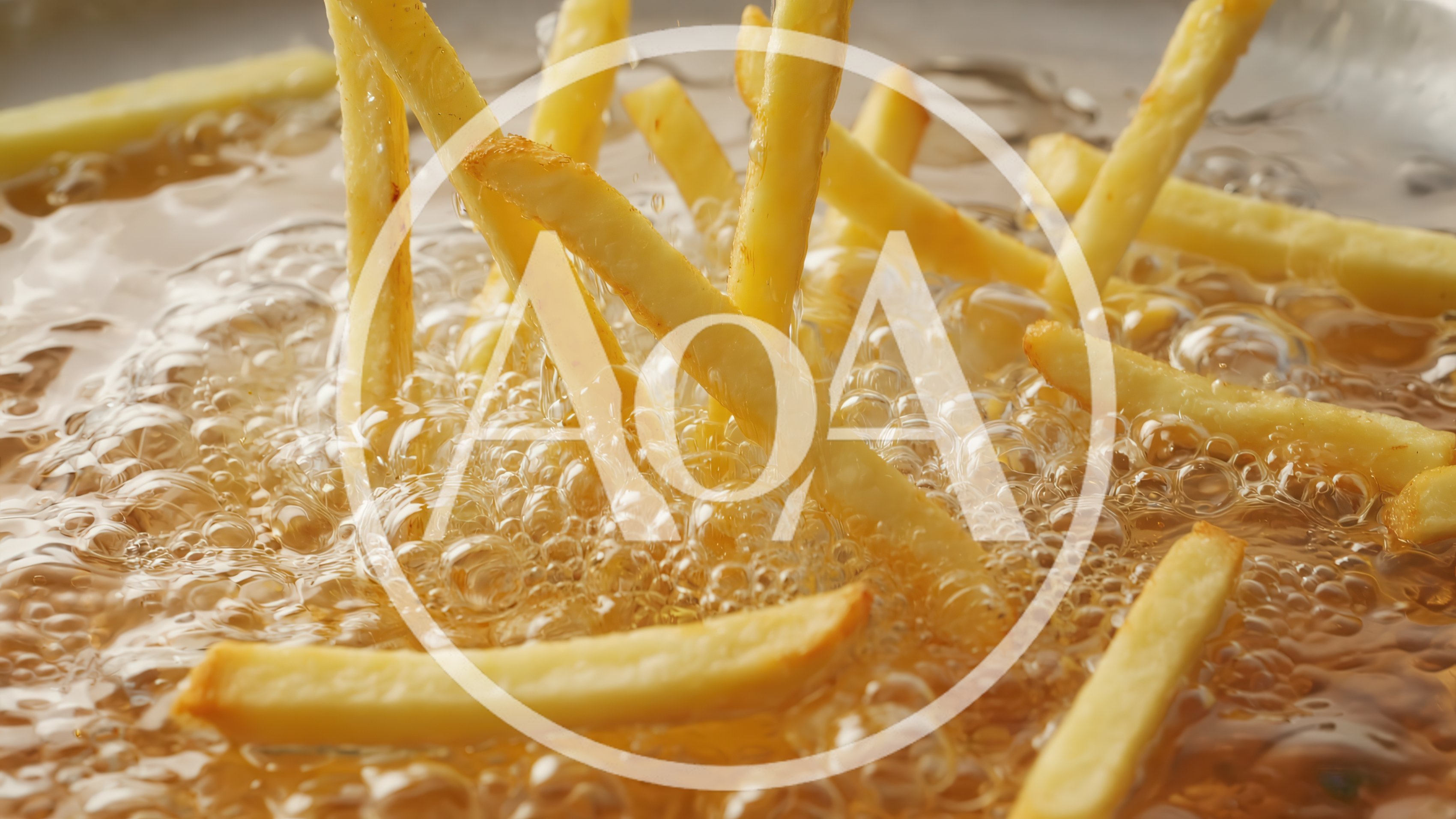 French Fries Frying In Hot Bubbling Oil
