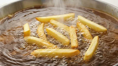 French Fries Deep Frying In Hot Oil