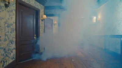 Thick Smoke Filling A Dimly Lit Hotel Hallway