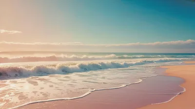 Gentle Ocean Waves Rolling Onto Sandy Beach