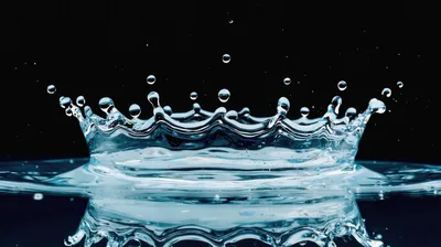 Water Crown Splash Against Black Background