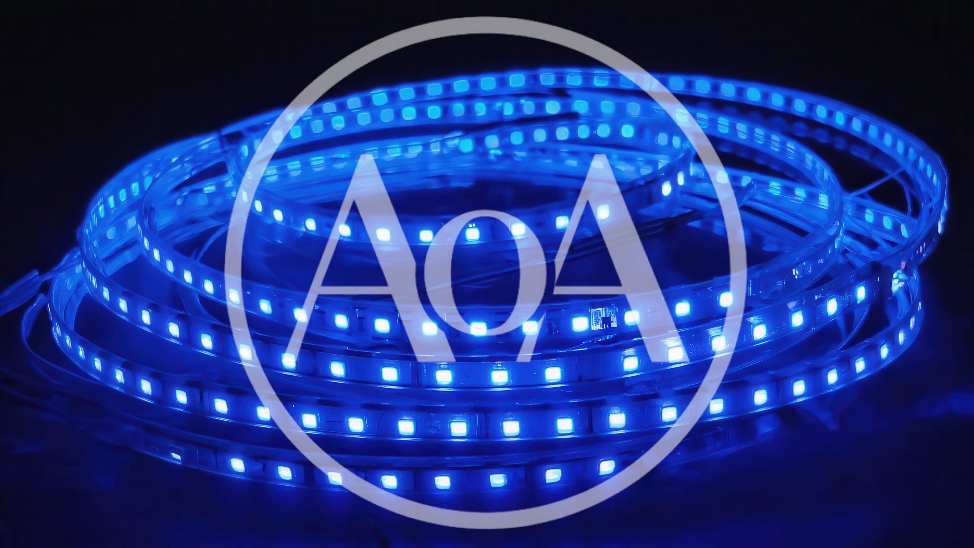 Coiled Blue LED Light Strip Glowing In Darkness
