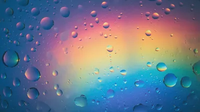 Water Droplets On Glass With Colorful Abstract Background