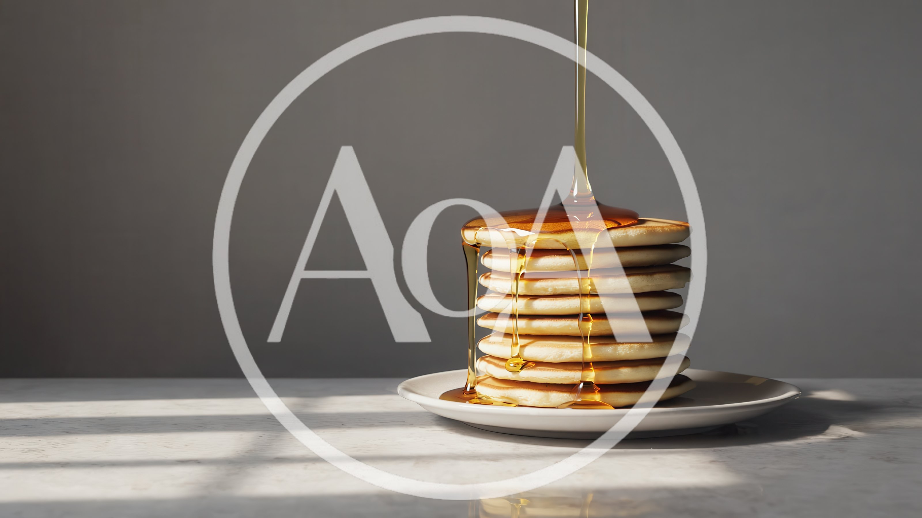 Maple Syrup Pouring Over A Stack Of Pancakes