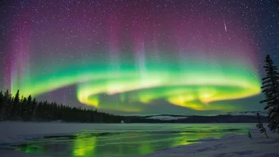 Vibrant Aurora Borealis Over Frozen Lake