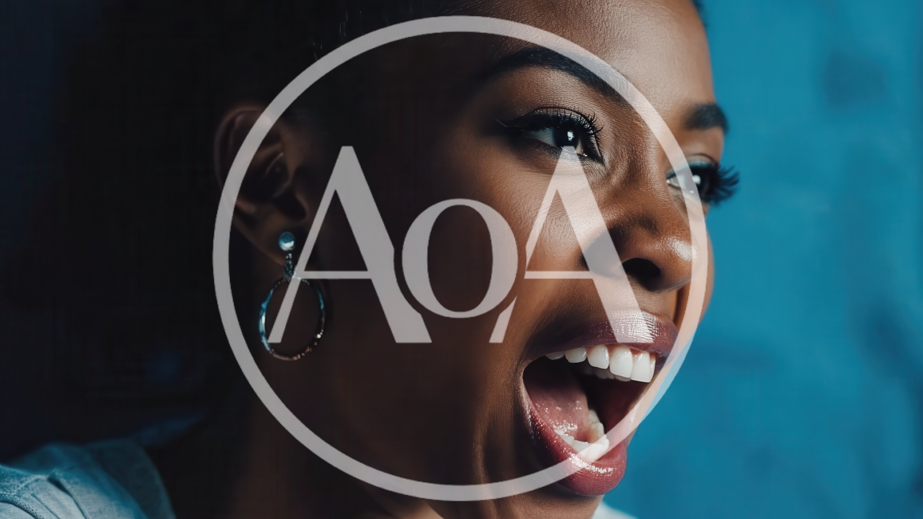 Close Up Portrait Of A Joyful Young Woman Laughing