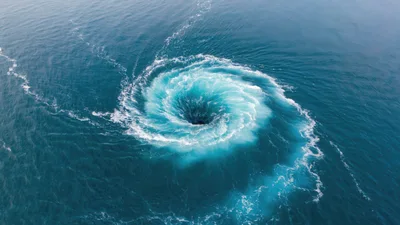 Aerial View Of A Large Ocean Whirlpool