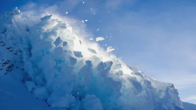 Massive Ice Avalanche Falling Down A Mountain Slope