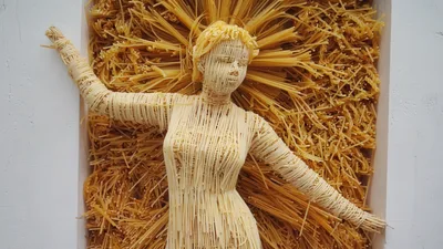 Artistic Sculpture Of A Woman Made From Spaghetti