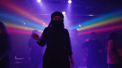 Person Wearing Niqab Dancing in a Nightclub
