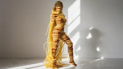 Surreal Human Figure Sculpted From Spaghetti And Meat Sauce