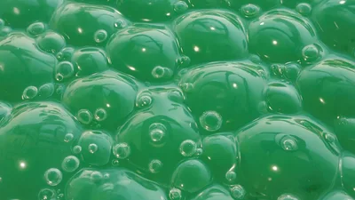 Close Up Of Green Bubbles In Liquid