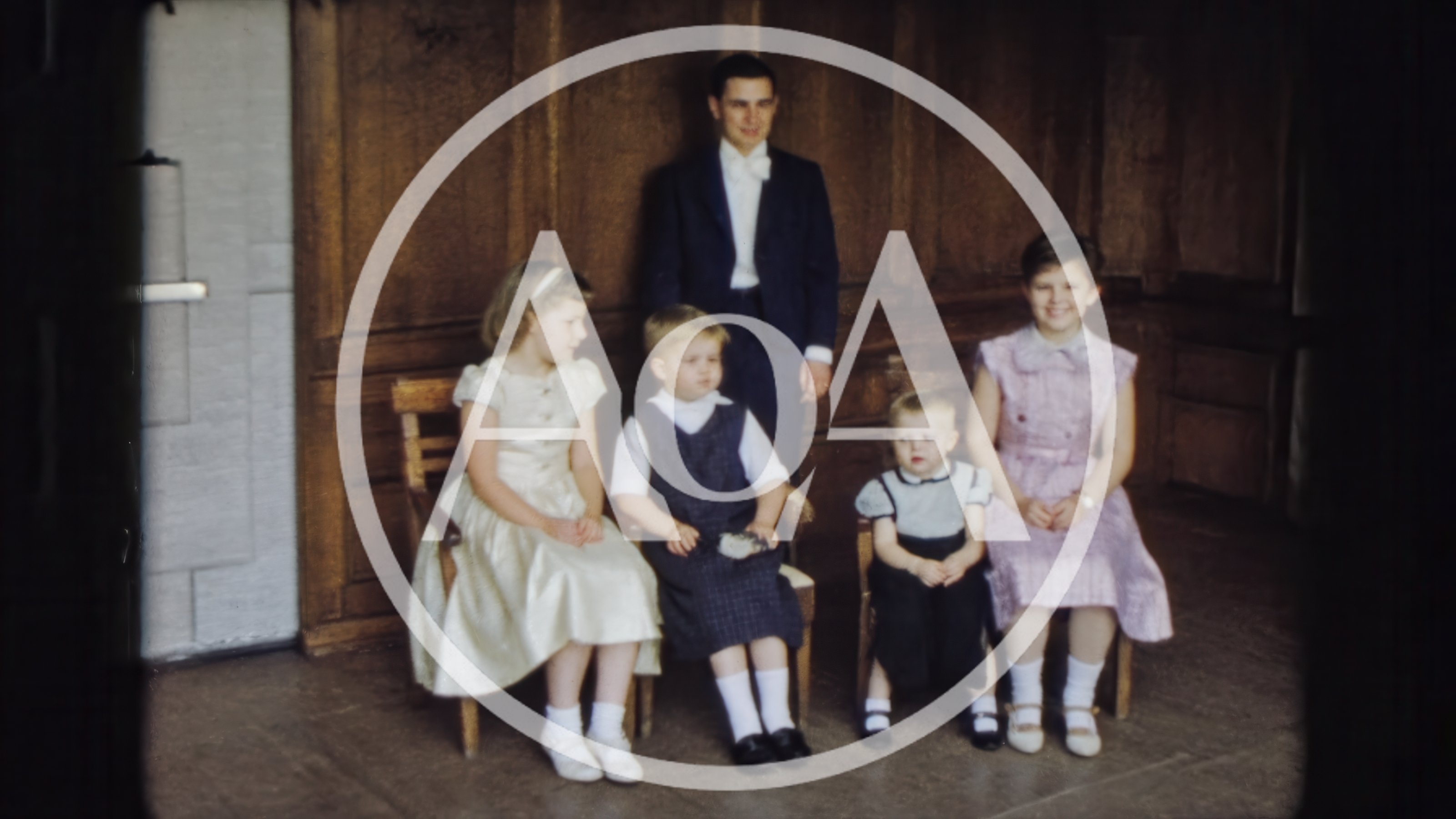 Vintage Family Portrait With Children In Formal Attire