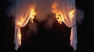 Burning White Lace Curtains Against Dark Smoky Background