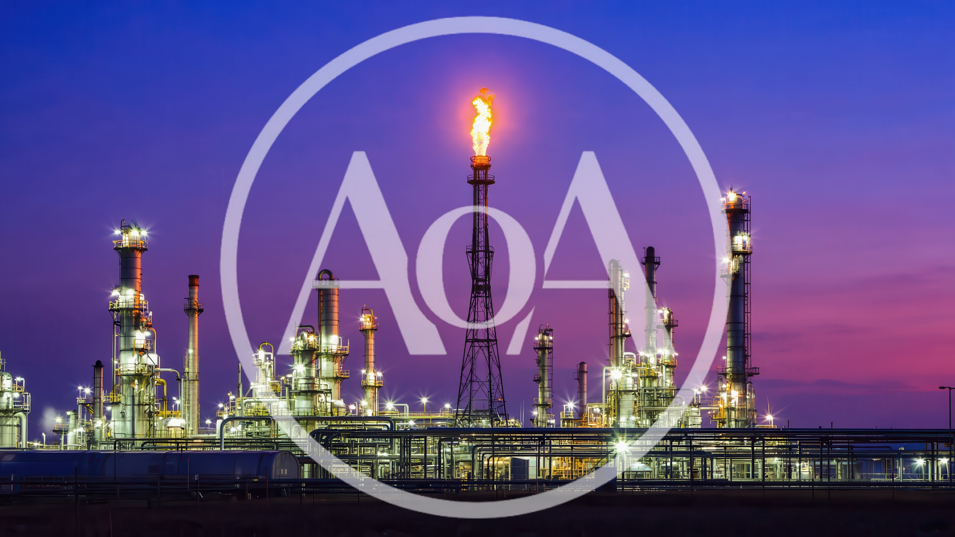 Oil Refinery Plant With Flare Stack At Sunset