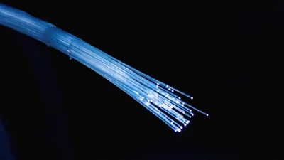 Fiber Optic Cable Strands Glowing With Blue Light
