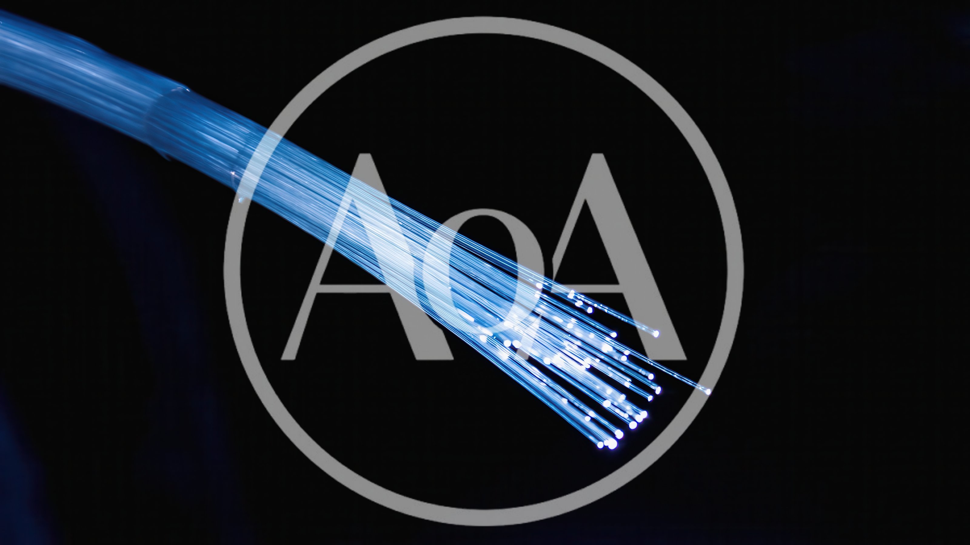 Fiber Optic Cable Strands Glowing With Blue Light