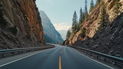 Driving Through A Scenic Mountain Canyon Road
