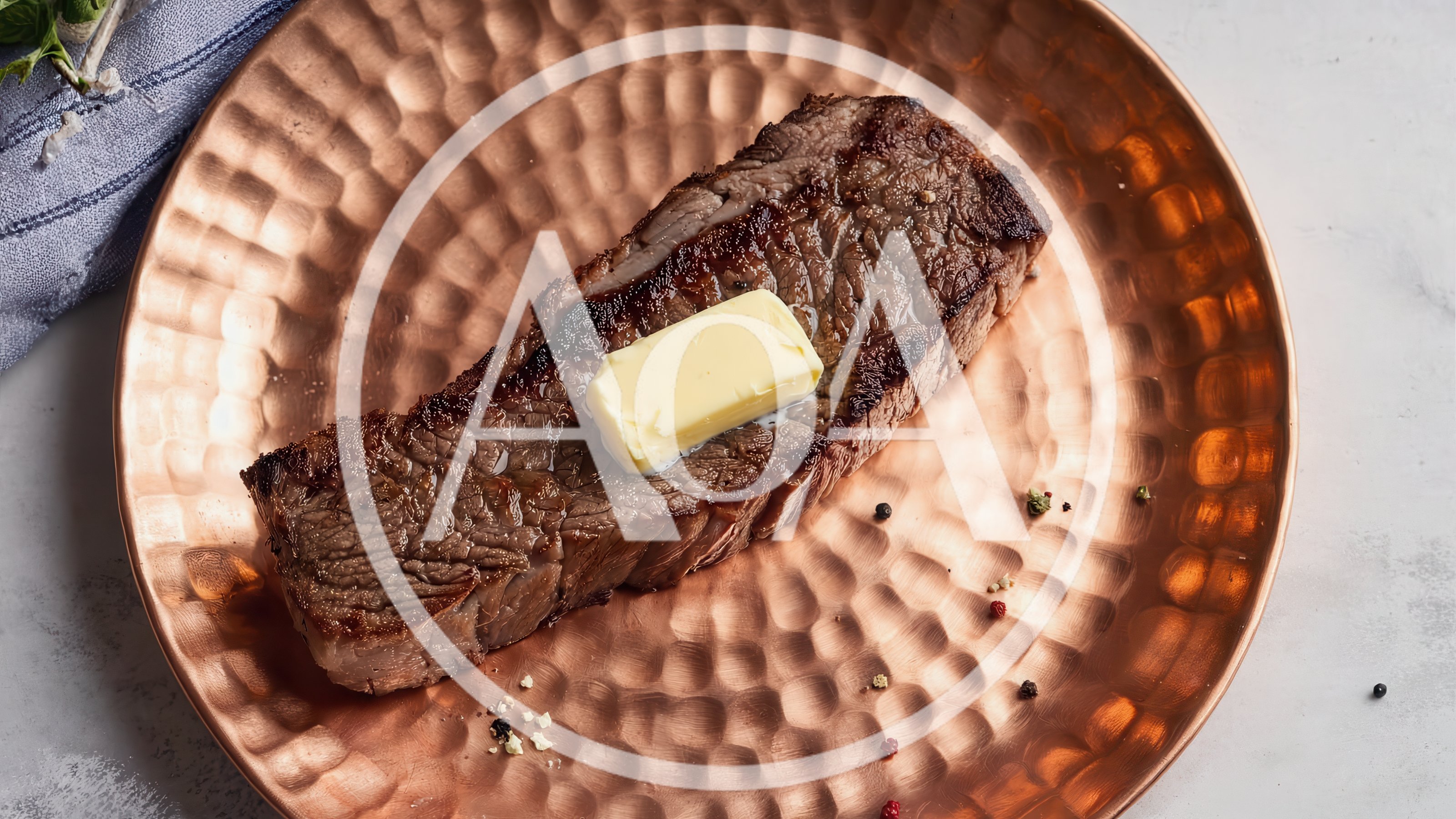 Grilled Beef Steak With Butter On Copper Plate