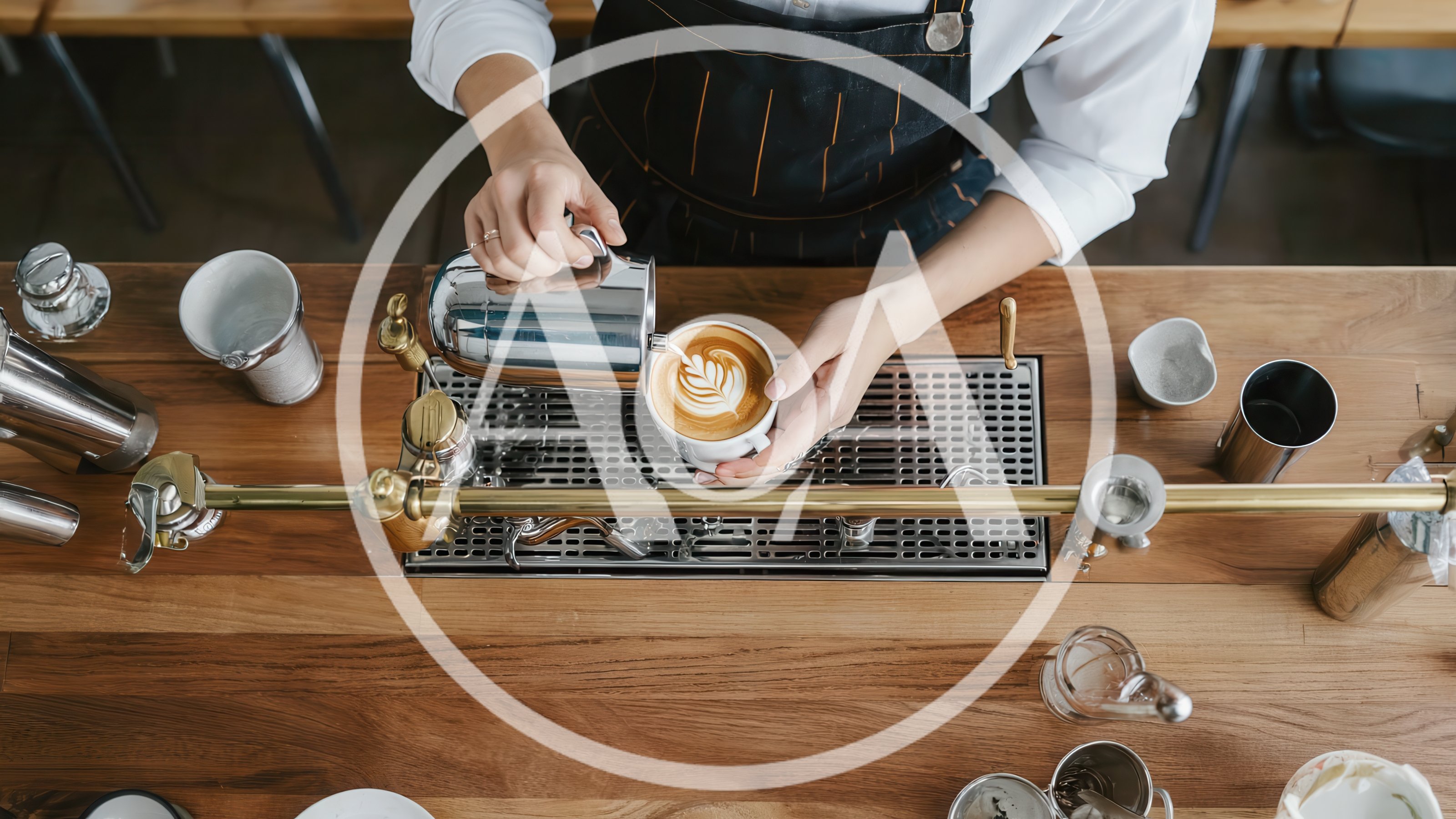 Barista Pouring Latte Art Into A Coffee Cup
