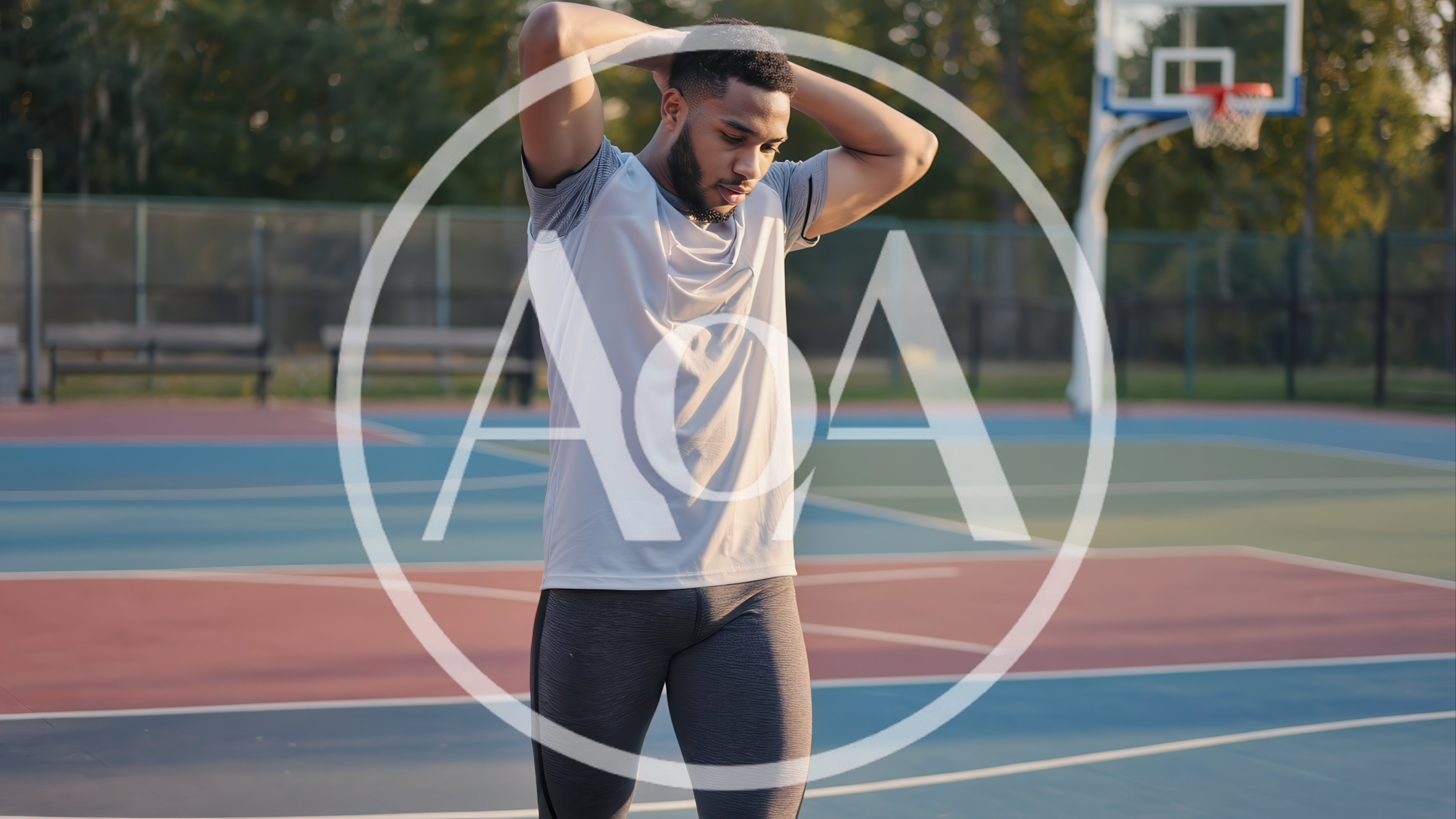 Athletic Man Stretching Arms On Outdoor Basketball Court