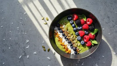 Healthy Green Smoothie Bowl With Berries And Seeds