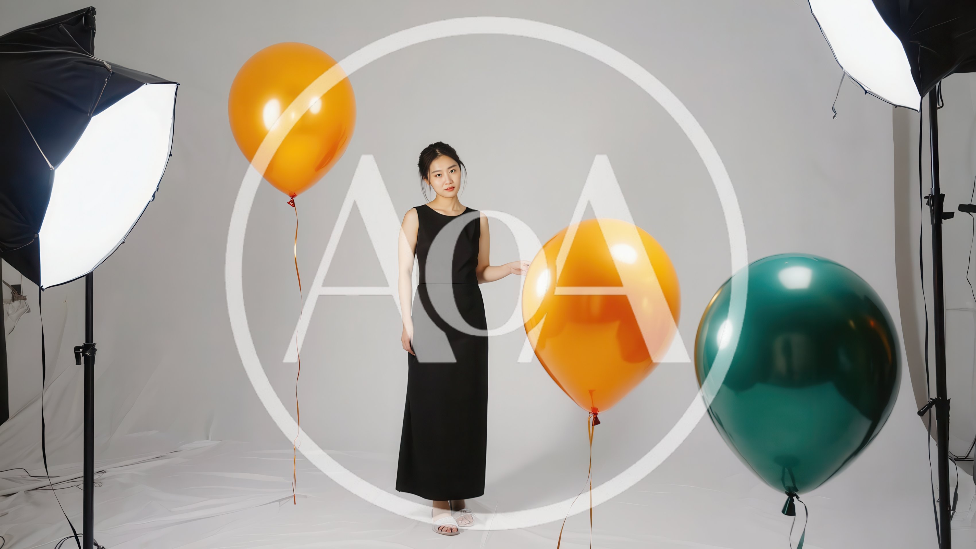 Young Woman Posing With Balloons In Professional Photo Studio
