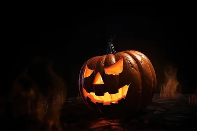 Glowing Jack O Lantern Pumpkin In Dark Setting
