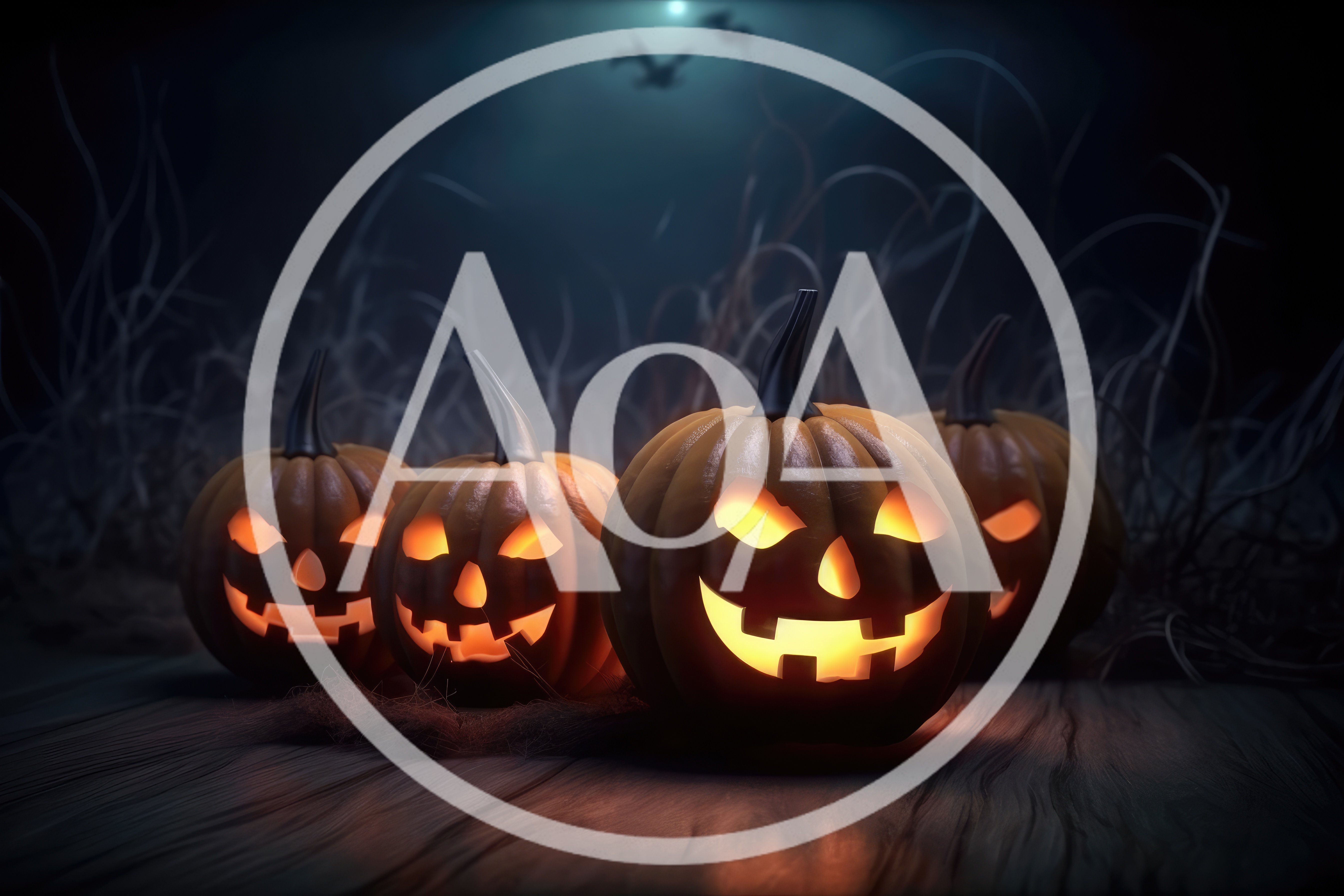 Four Glowing Jack O Lanterns On Wooden Surface
