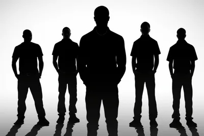 Silhouettes Of Five Men Standing In A Row