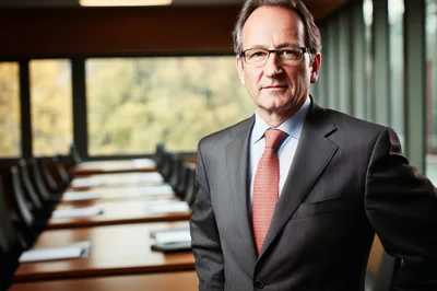 Professional Businessman Standing In A Modern Corporate Boardroom