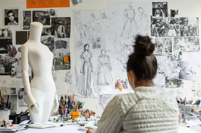 Fashion Designer Working In A Creative Studio