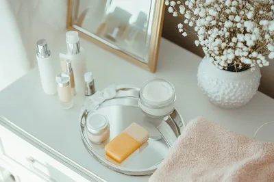 Skincare Products Arranged On A Vanity Table