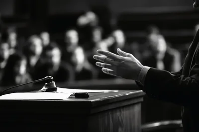 Lawyer Speaking At A Courtroom Podium
