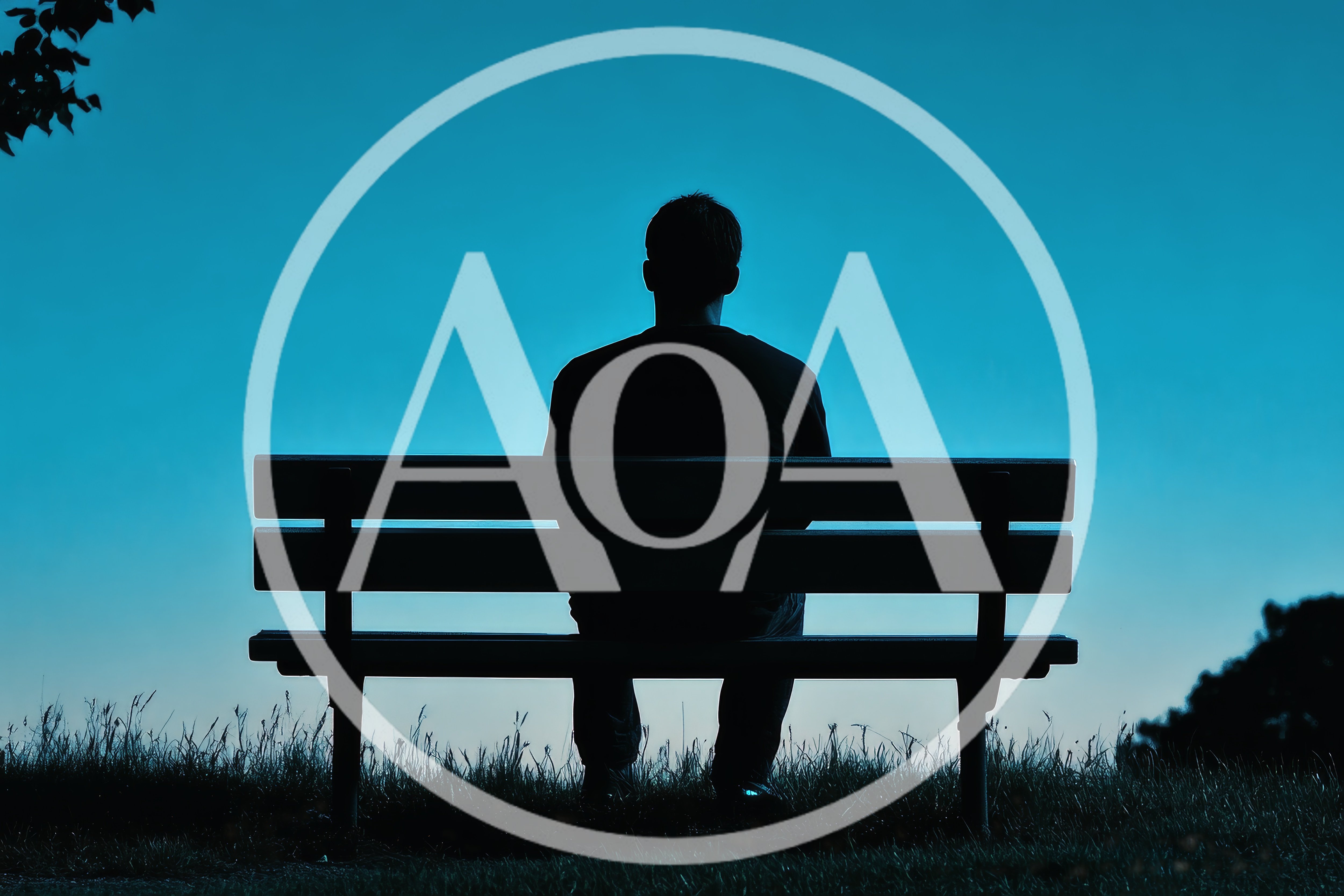 Silhouette Of A Man Sitting Alone On A Bench