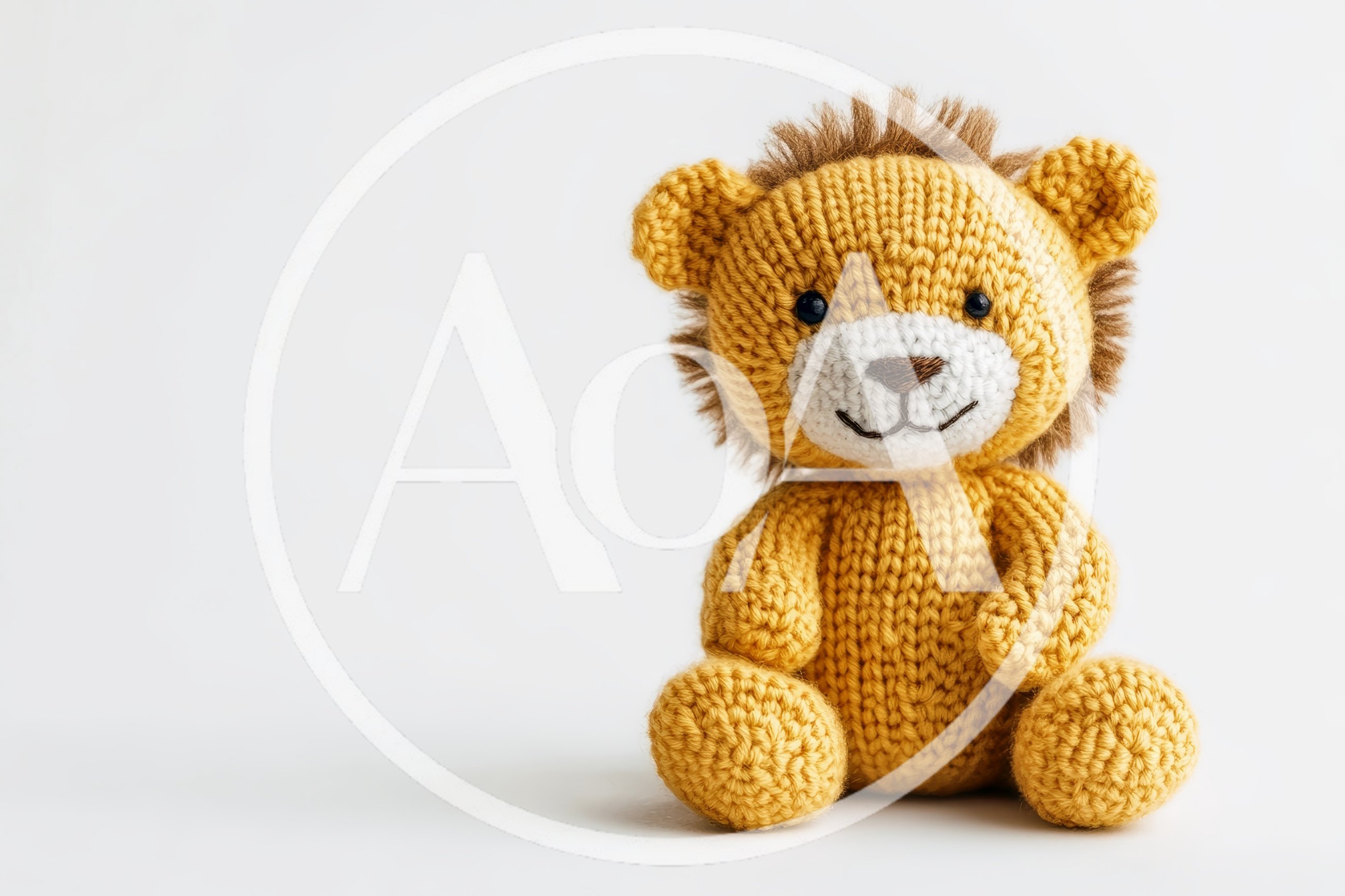 Knitted Lion Stuffed Toy On White Background
