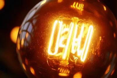 Close Up Of Glowing Vintage Edison Light Bulb