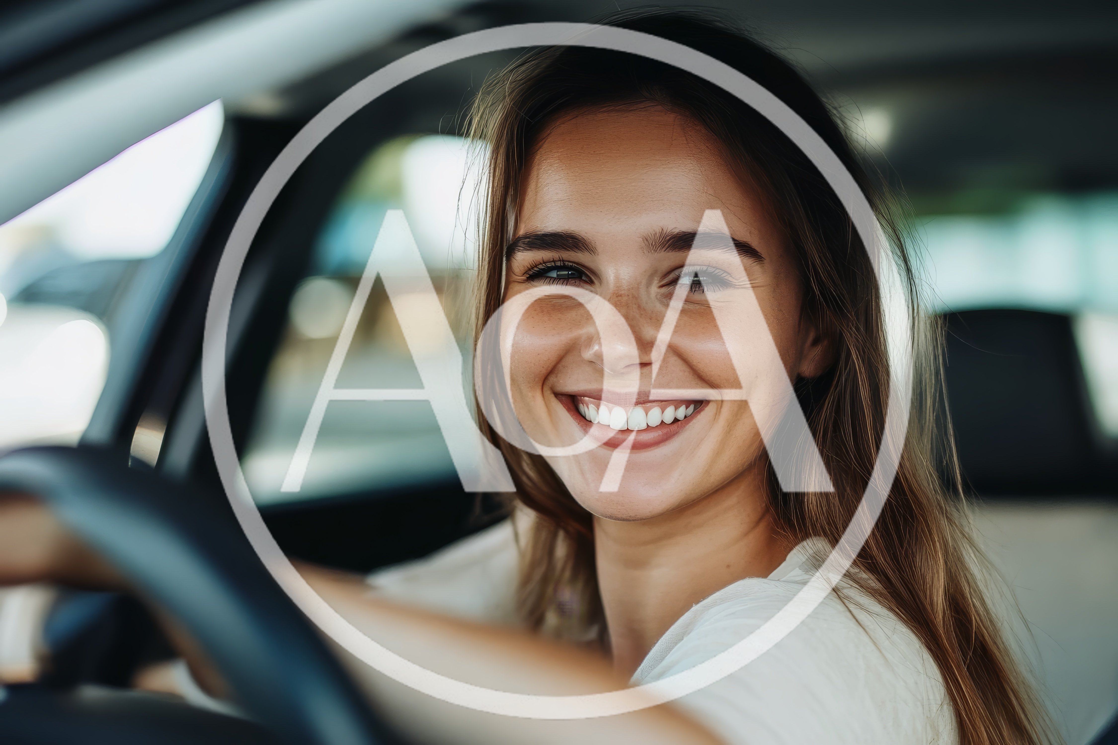Happy Young Woman Driving A Car