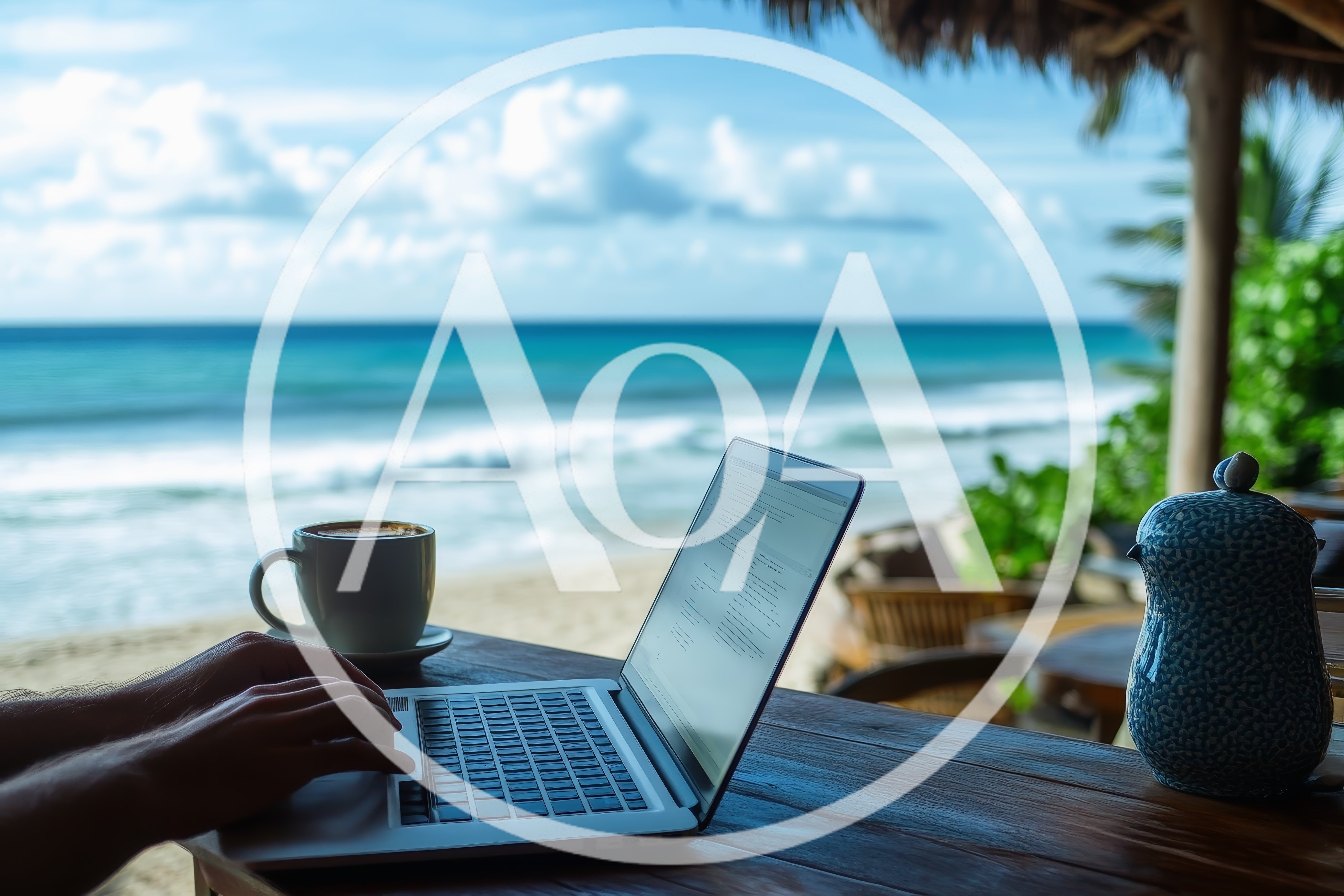 Person Working On Laptop At Beachside Cafe