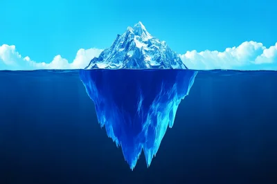 Massive Iceberg Floating In Deep Blue Ocean Waters