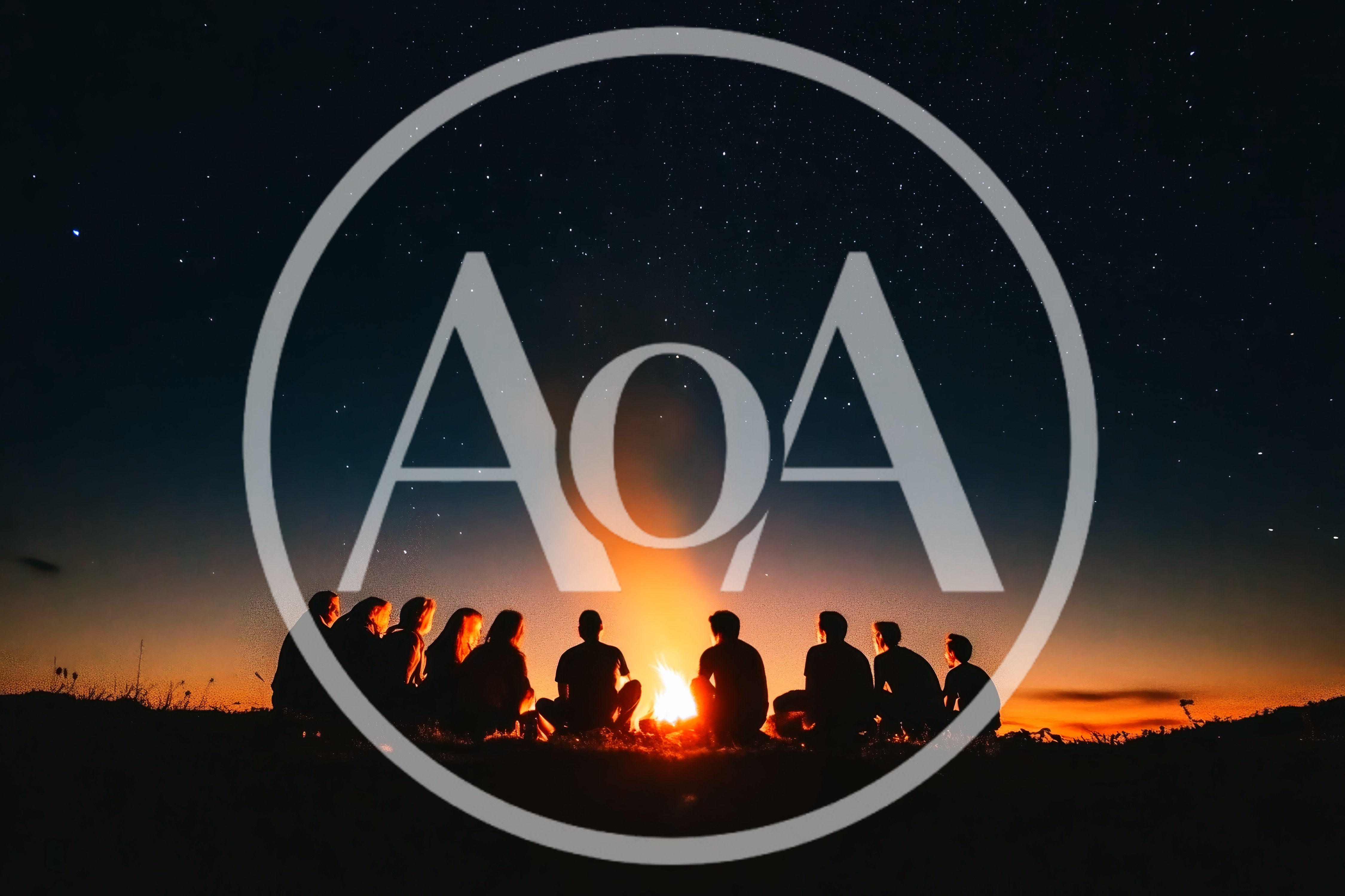 Group Of Friends Sitting Around A Campfire At Night