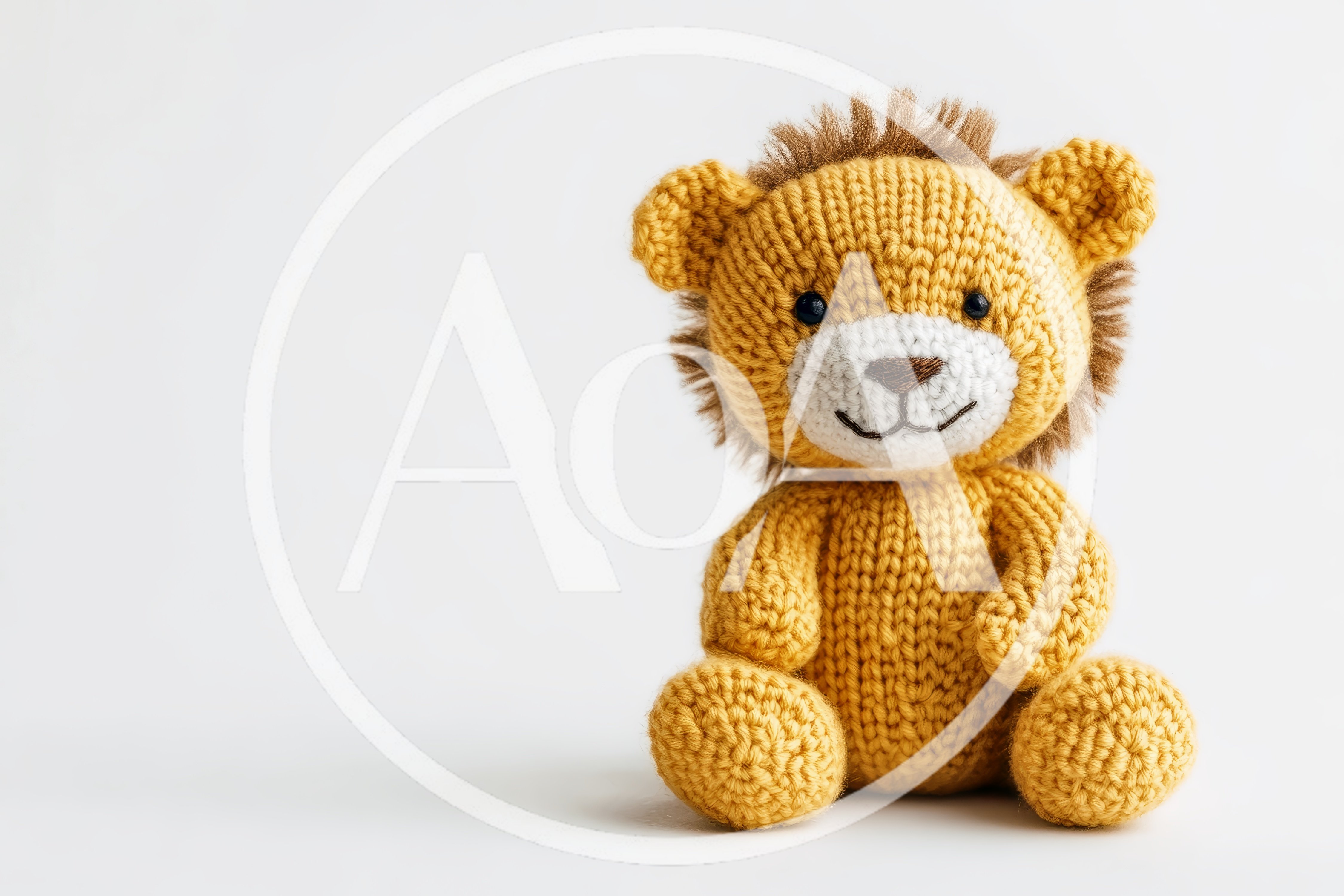 Knitted Lion Stuffed Toy On White Background